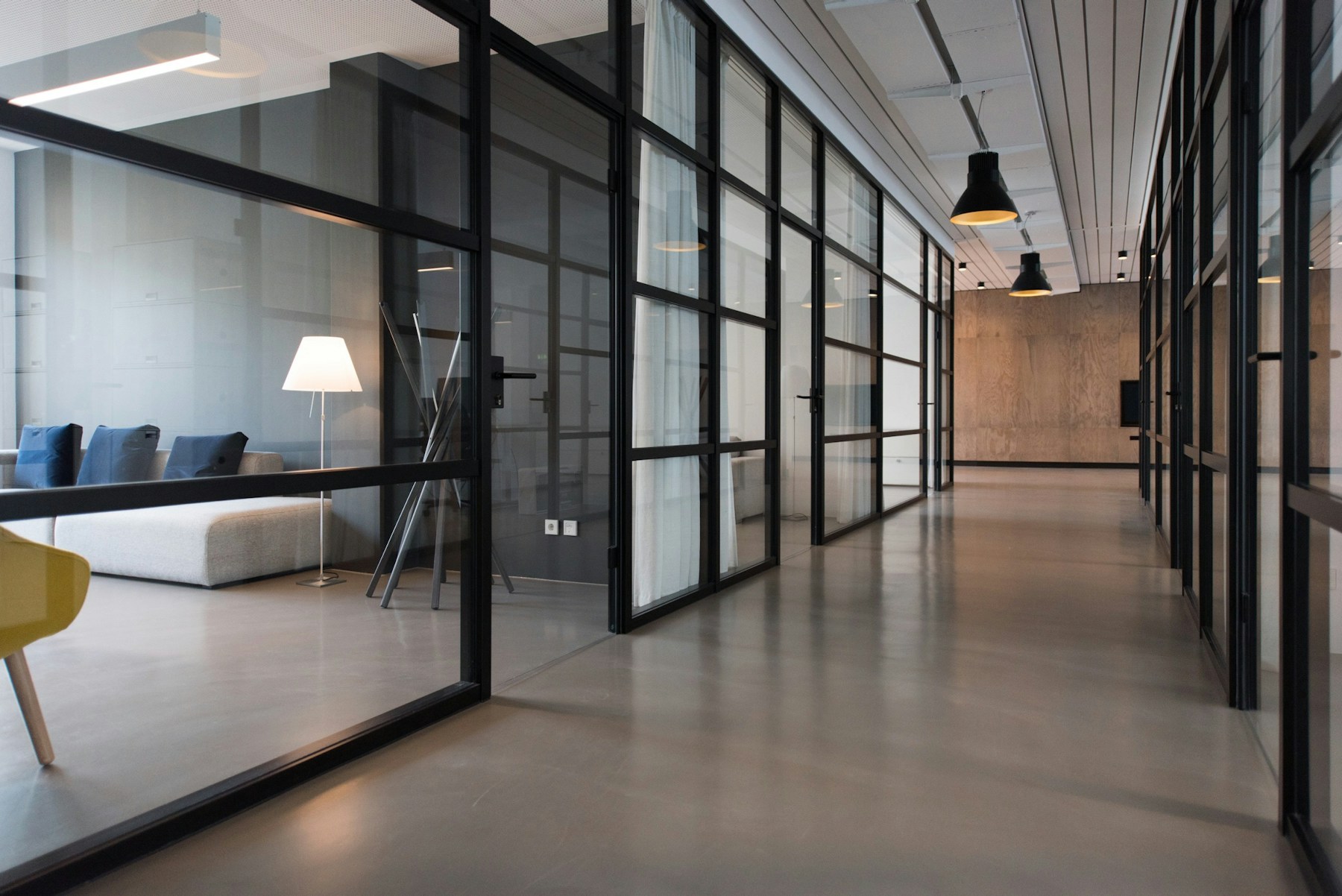 Illustrative modern office interior with open seating and natural light